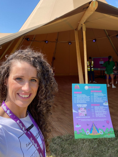 Jennifer Barnfield-Lee smiling outside a tent