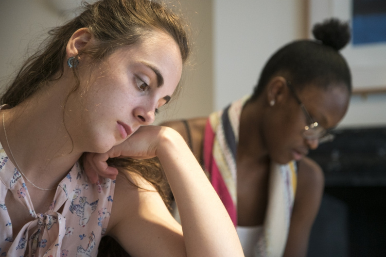 Two young people reading