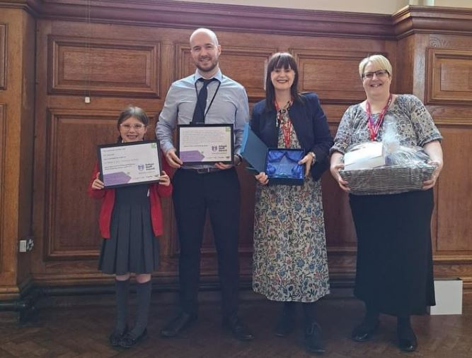 Wales Primary Winner with certificate and trophy