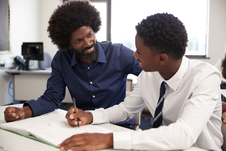 Teacher talking to a student